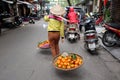 Street fruit vendor in Hanoi's Old Quarter.