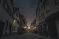 Street between German typical houses at night