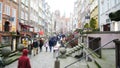 Street of Goldsmiths in historic old town of Gdansk in Poland - crowd, historic buildings and blurred picture