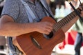 Street guitarist close up