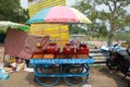 Street hawker cart with traditional food in a village