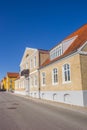 Street with historic houses in the center of Christiansfeld Royalty Free Stock Photo