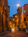Street in historical district of Bologna at night
