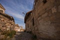 Street and homes on the slopes of the ancient fortress of Uchisar. Cappadocia Royalty Free Stock Photo