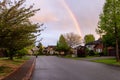 Street and Homes View at a Quite Residential Neighborhood in Suburban Area Royalty Free Stock Photo