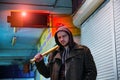 Street hooligan with wooden bat in subway Royalty Free Stock Photo