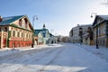 street Kayuma Nasyri Kazan. Old wooden houses with mosque Tatarstan. Winter snow