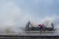 Street kids enjoying high waves during mumbai Cyclone at worli sea face,Mumbai,Maharashtra,India