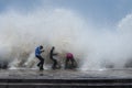 Street kids enjoying high waves during mumbai Cyclone at worli sea face,Mumbai,Maharashtra,India