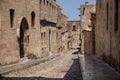 Street Of Knights In Rhodes City. Ruins Of The Castle And City Walls Of Rhodes. Narrow Streets Of The Old Town.