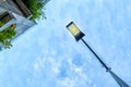 Street lamp against the blue sky. Bottom View Architecture. Royalty Free Stock Photo