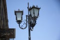 Street lamp against a cloudy sky.