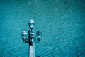 Street lamp against river