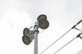 Street lamp against white sky