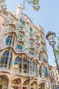 Street lamp on the backdrop of the Casa Batllo building in Barcelona in autumn