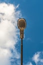 Street lamp on blue sky background