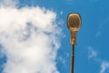 Street lamp on blue sky background