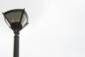 Street lamp in a city Park on a white background Royalty Free Stock Photo