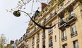 Street lamp and facades of a traditional apartment buildings of Paris France