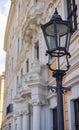 Street lamp in the inner city of Dresden. A retro vintage street lamp in front of an old style renovated house. The street lamps Royalty Free Stock Photo