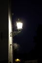 Street lamp lit at night Royalty Free Stock Photo