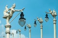 Street Lamp, Mythical female bird with a human head, Kinnaree and blue sky