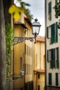 A street lamp on a narrow street in Florence.Tuscany, Italy