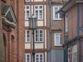 Street lamp and old European brick buildings in Stade, Germany. Royalty Free Stock Photo