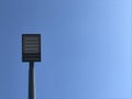 Street lamp over blue background. Sunny day Royalty Free Stock Photo