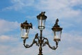Street lamp with pigeons