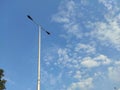 Street lamp post against the background of blue sky during the day Royalty Free Stock Photo