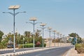 Street lamp powered with a solar panel battery against blue sky.  Alternative energy and save ecology concept Royalty Free Stock Photo