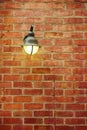 Street lamp on red brick wall Royalty Free Stock Photo