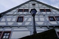 Street lamp in retro style in front of a well-kept half-timbered facade Royalty Free Stock Photo