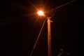 Street lamp shining at night in township Royalty Free Stock Photo