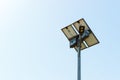 Street lamp with solar cell panel on blue sky background Royalty Free Stock Photo