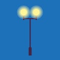 Street Lamp with Two Burning Light Bulbs on Blue