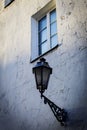 A street lamp on the wall of a house in the old center of Vilnius Royalty Free Stock Photo