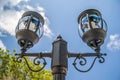 Street lamps and blue sky.