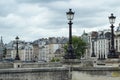 Street lamps over traditional Parisian architecture