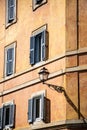 Street lamps on the walls of Italian cities in Italy