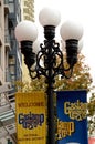 Street lamps and welcome signs in Gaslamp quarter