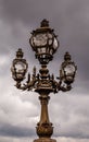 Street Lantern on the Alexandre III Bridge against Cloudy Sky Royalty Free Stock Photo