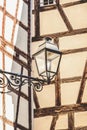 Street lantern on the half timbered wall background Royalty Free Stock Photo