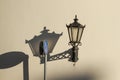 Street lantern with shadow in Riga Royalty Free Stock Photo