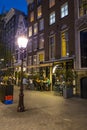 Street lanterns on the sidewalks in Amsterdam - evening view - AMSTERDAM - THE NETHERLANDS - JULY 20, 2017