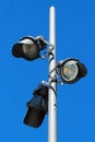 Street LED lamps against blue sky background