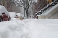 Street level shot during a blizzard with heavy snowfall in Harlem, New York City Royalty Free Stock Photo