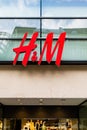 Street level view of H and M lighted storefront