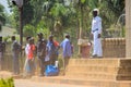 The street life of Uganda`s capital. Crowd of people on the streets and heavy traffic